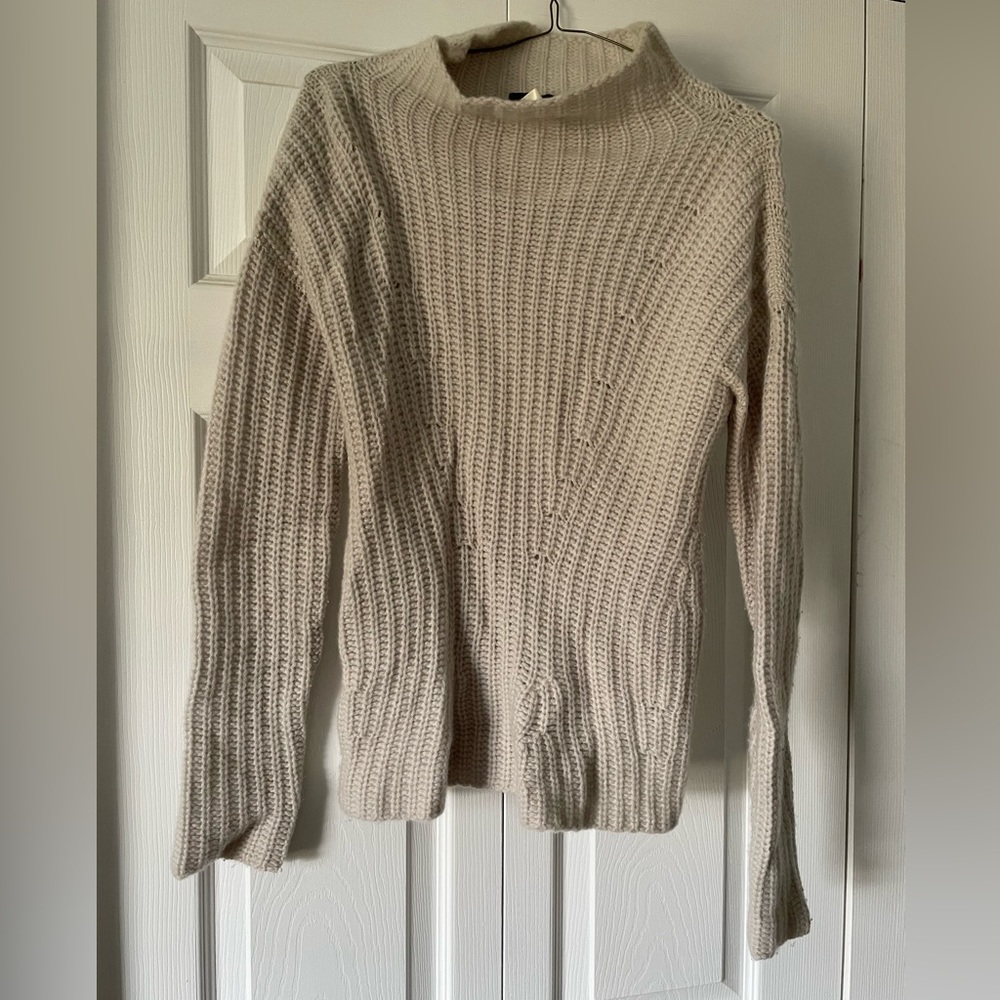 100% Cashmere mock turtleneck sweater.  Size 40.  Oatmeal white/grey color.